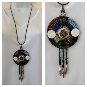 Vintage Native American artisan medallion pendant on black chain